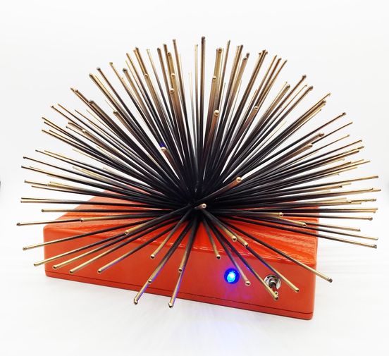 Potar Design Super Sound Urchin with 10" diameter spines, in orange